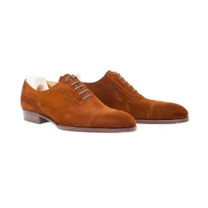Oxford, plain sewn, straight toe box and sparingly perforated vamp